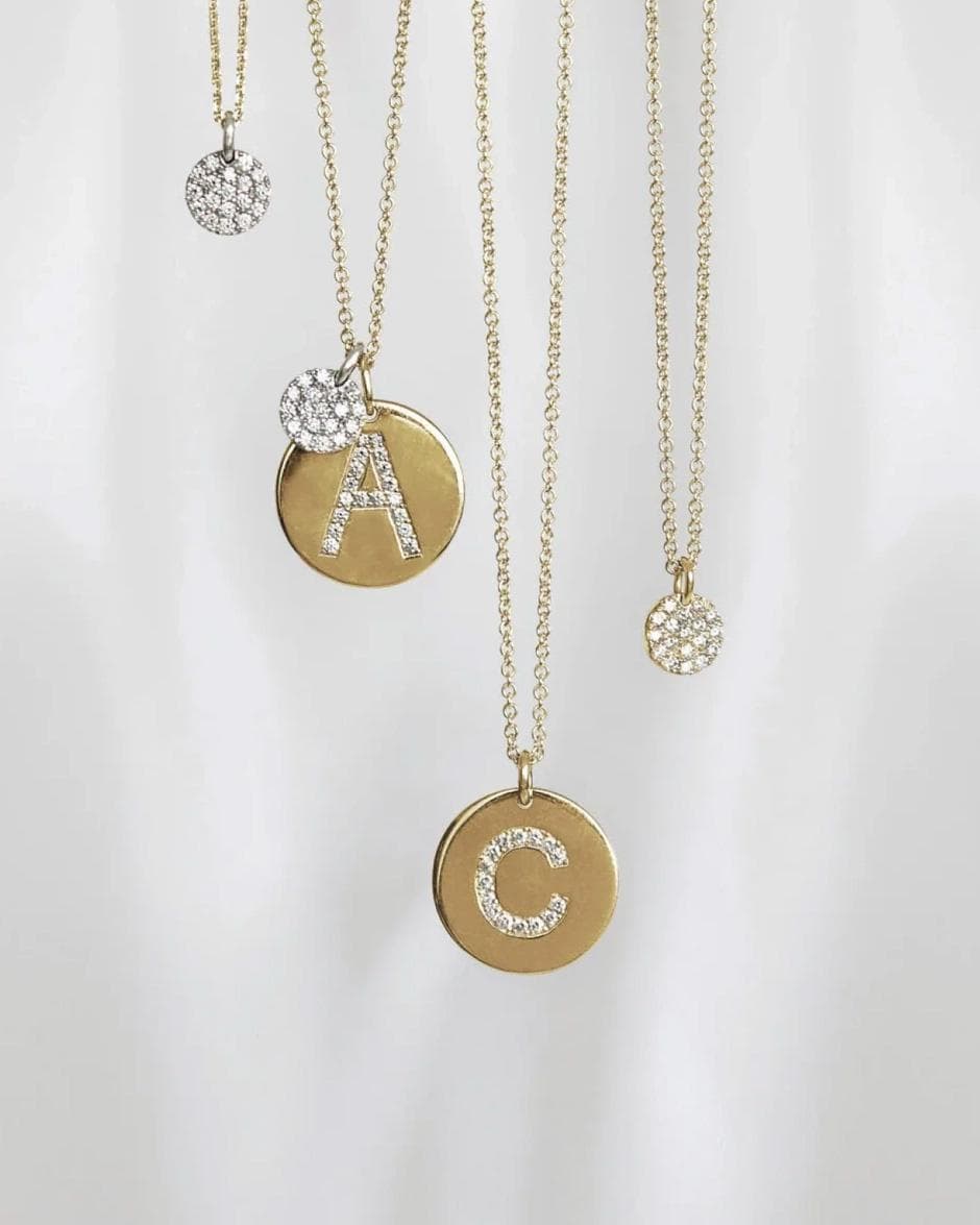 Pavé disc and initial pendants on fine gold chains
